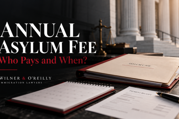 Asylum case folder, calendar, and payment receipt on a legal desk illustrating annual asylum fee deadlines