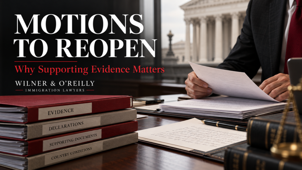 Evidence folders and a declaration on a legal desk illustrating motions to reopen immigration cases